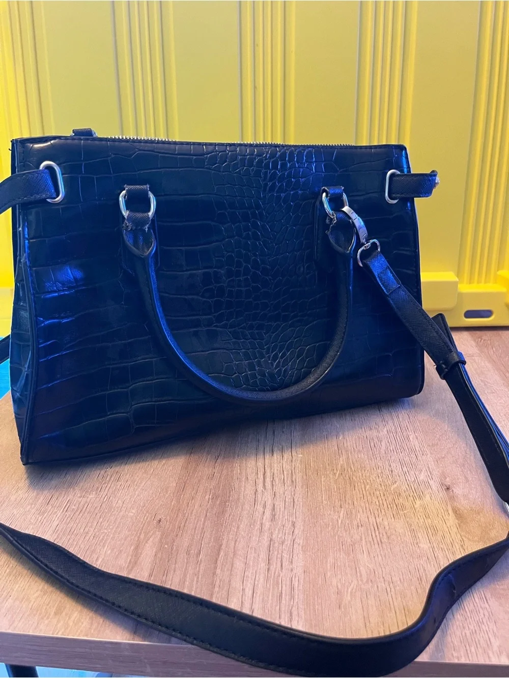 Guess Black Embossed Satchel Bag in good condition except missing one button